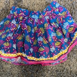 Oshkosh pattered skirt. Embroidered detail on seam of skirt. 2T